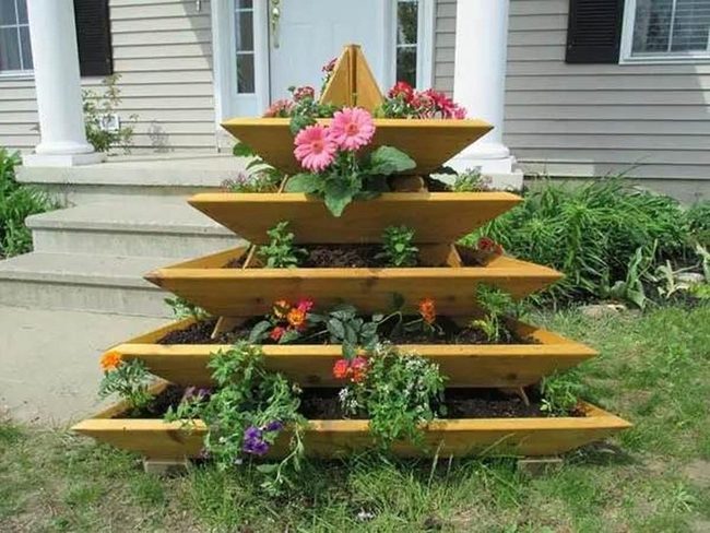 Cascading Blooms On Wooden Shelves