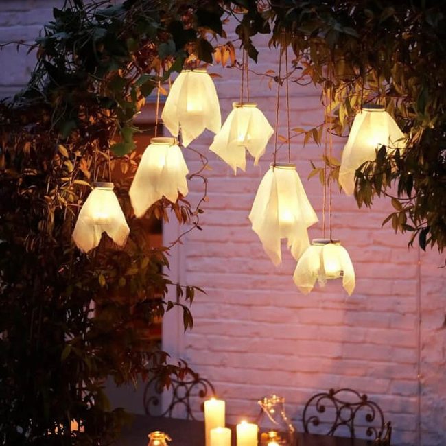 Lanterns Among Green Branches