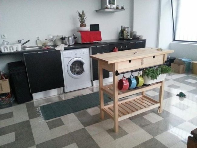 Monochrome Kitchen With Wooden Island