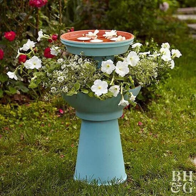 Upcycled Birdbaths Among Blooms