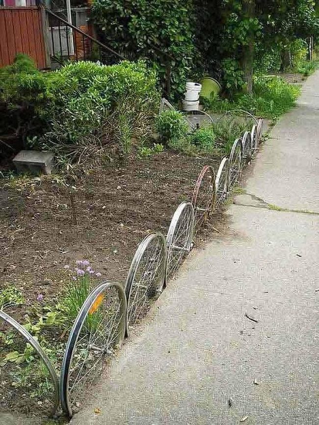 Bicycle Wheels, Shadowed Garden Borders