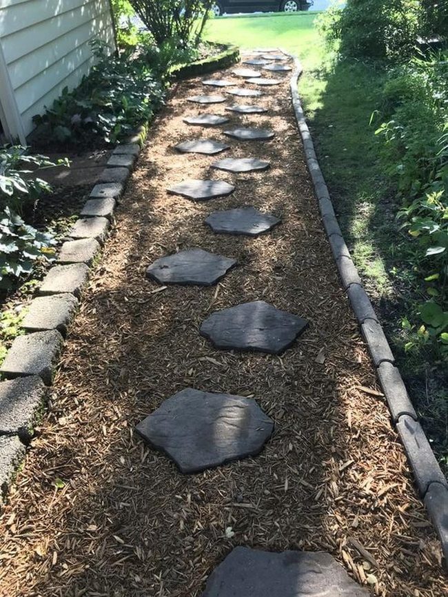 Stone Path Through Green Garden