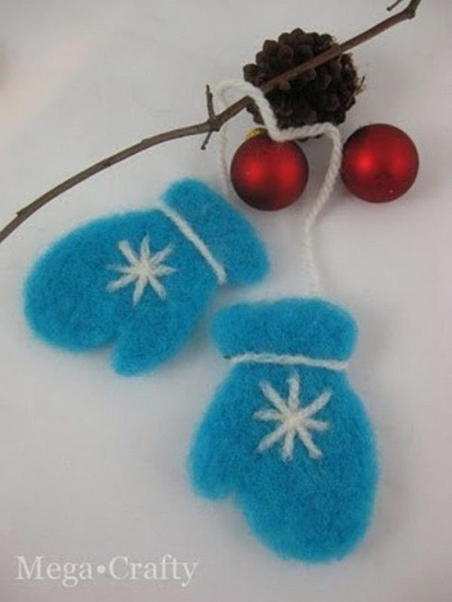Fluffy Blue Mittens On Wood