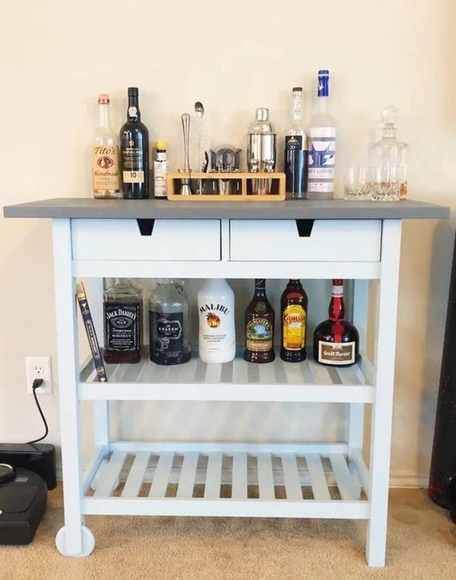 White Bar Cart With Colorful Bottles