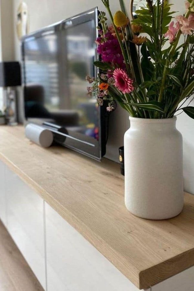 White Cabinet With Nature-Inspired Wood Countertop