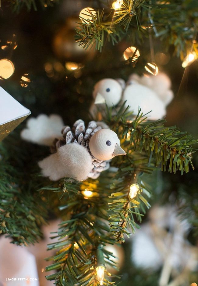Green Pine With Wooden Birds