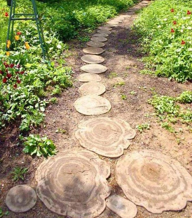 Wood Slice Path Through Blooming Garden