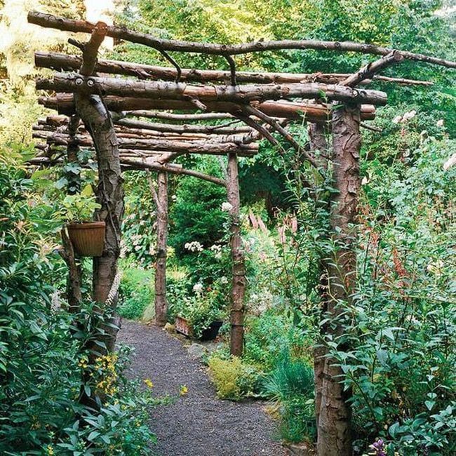 Wooden Arbor With Hanging Greenery