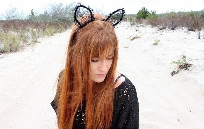 Red Hair, Black Ears, Sand