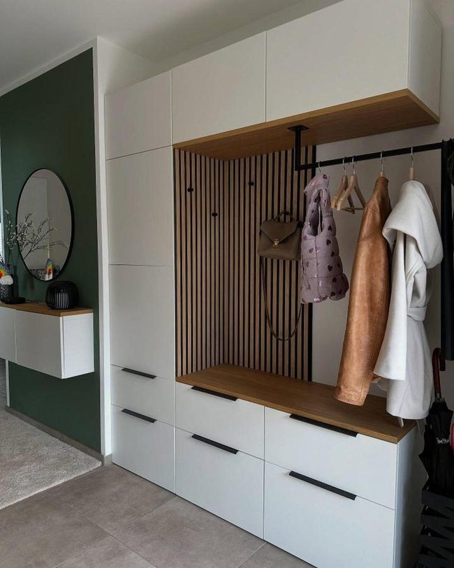 Vertical Rustic Timber Slats Over White Cabinets