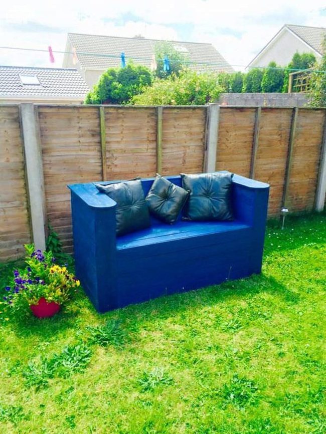 Blue Benches In Green Garden