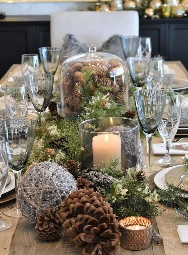 Silvered Pinecones And Candlelit Glass