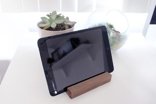 Black Tablet On Wooden Desk