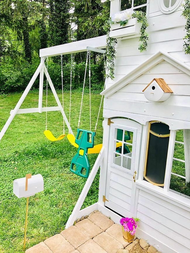 White Clapboard Playhouse Swings