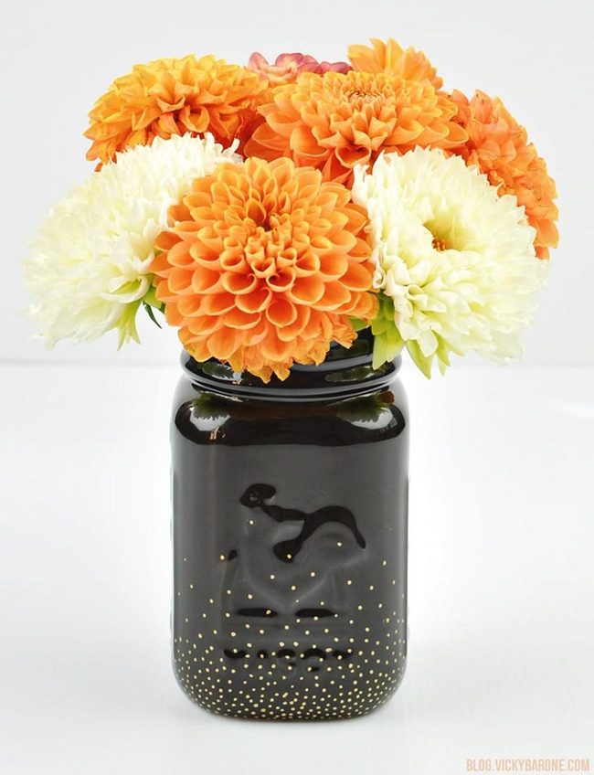 Orange Blooms In Golden Glass
