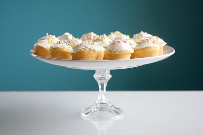 Miniature Frosted Cupcakes On Glass