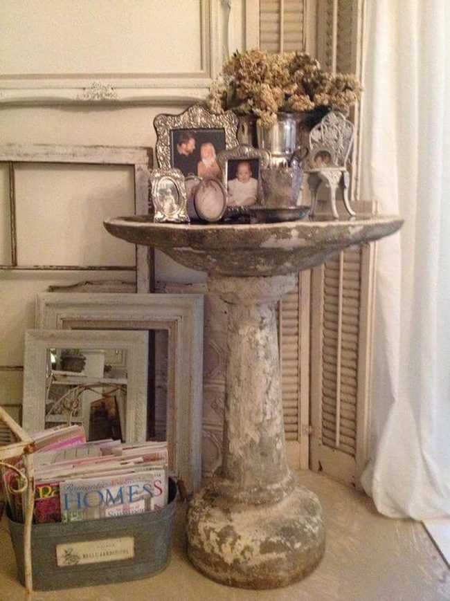 Stone Birdbath With Dried Flowers