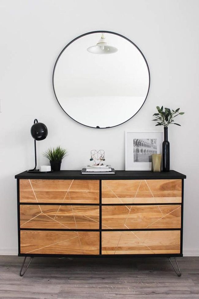 Black Wood Drawers And Green Branches