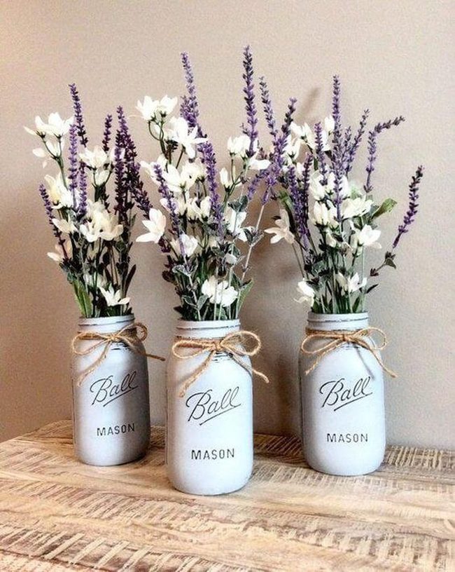 Fresh Blooms In Glass Vessels