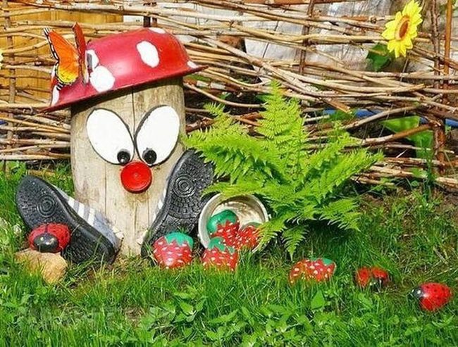Hand-Painted Pebbles On Stump