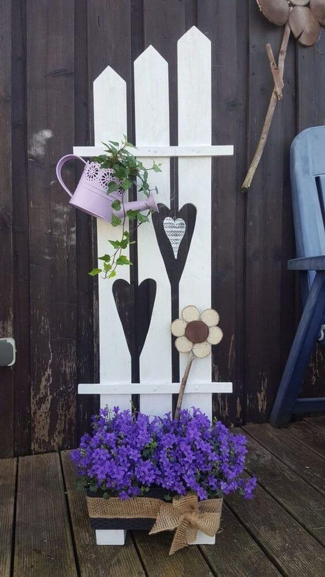 Salvaged Wood Garden Wall With Cascading Vines