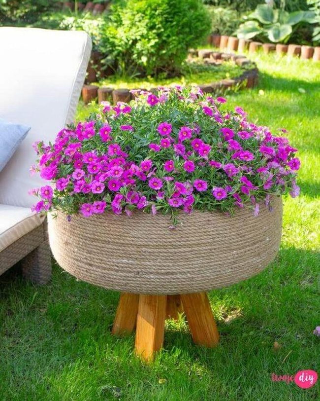 Pink Petunias In Jute Planter