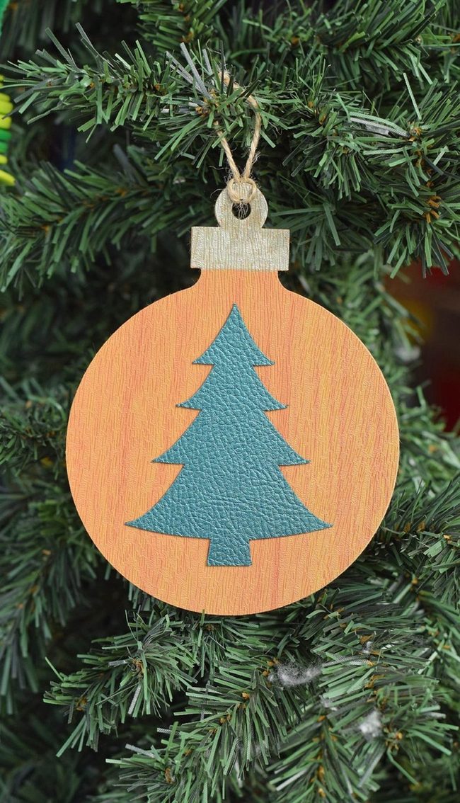 Teal Leather Ornaments On Pine