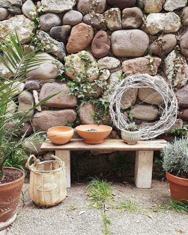 Potted Plants On Elevated Bench