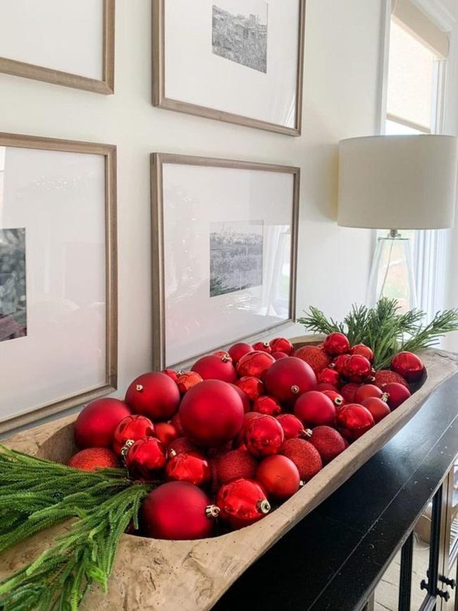 Red Ornaments In Wooden Bowl