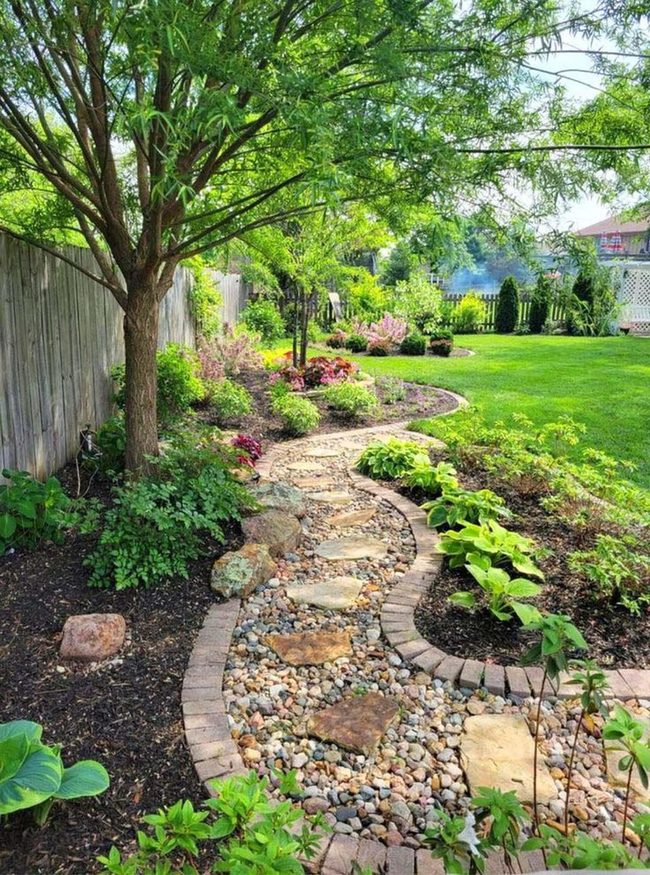 Stone Pathway Through Blooming Garden