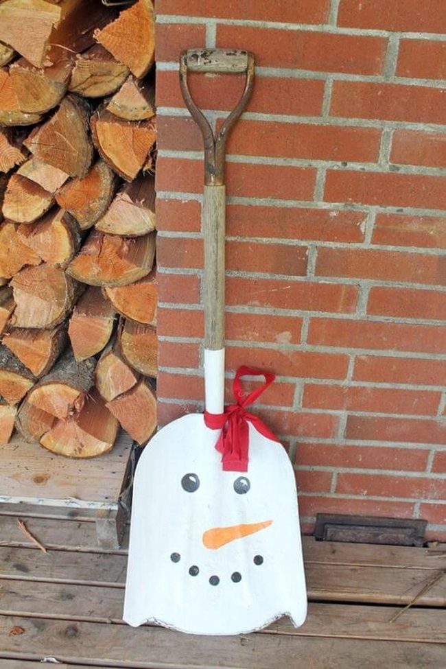 White Shovel Snowman Red Ribbon