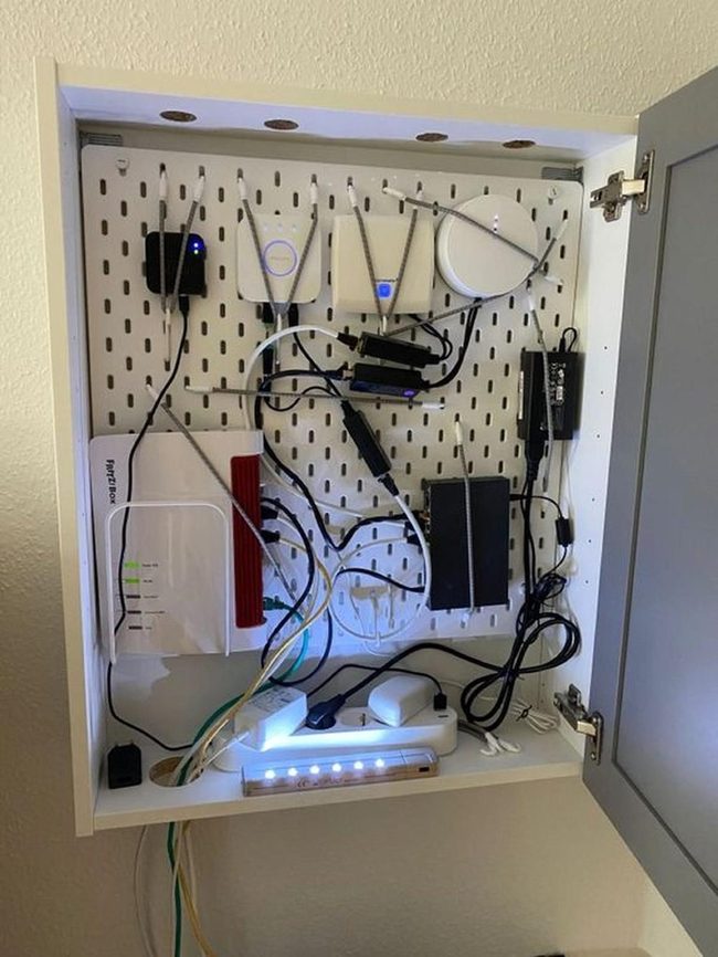 White Pegboard Tech Station