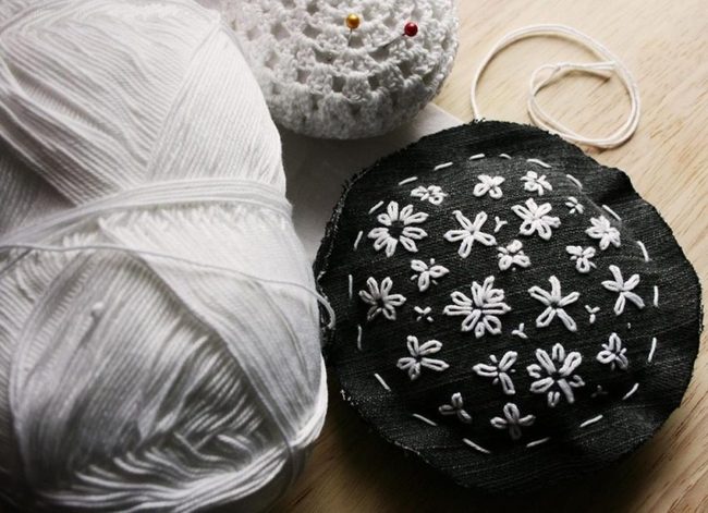 Golden Pins On Crochet Cushion
