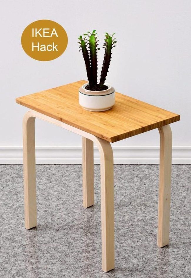 Light Wood Table With Gray Speckled Floor