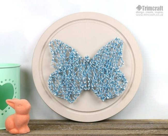 Blue String Butterfly On Wood