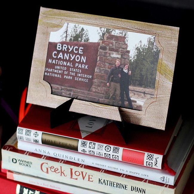 Wooden Frame Among Colorful Books