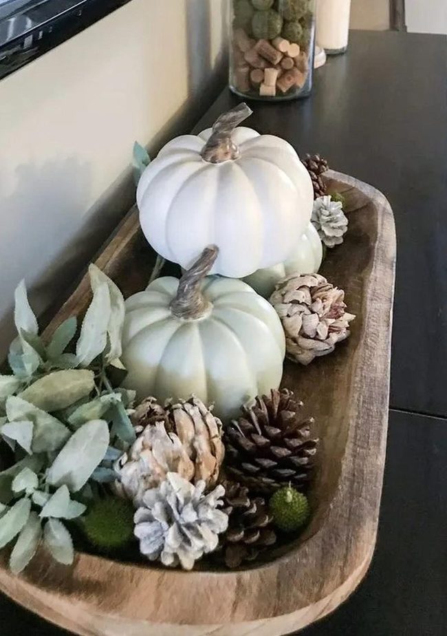 Pale Pumpkins On Weathered Wood