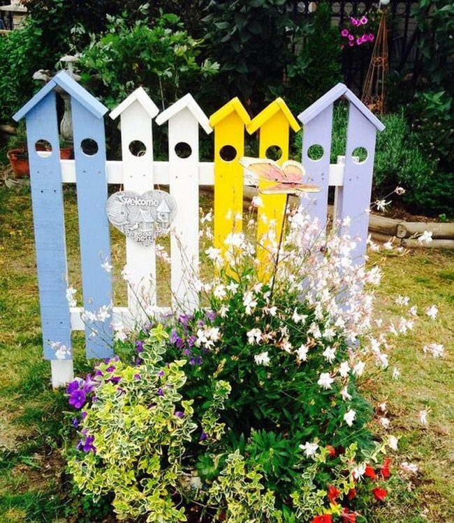 Painted Picket Fence Blooming Over