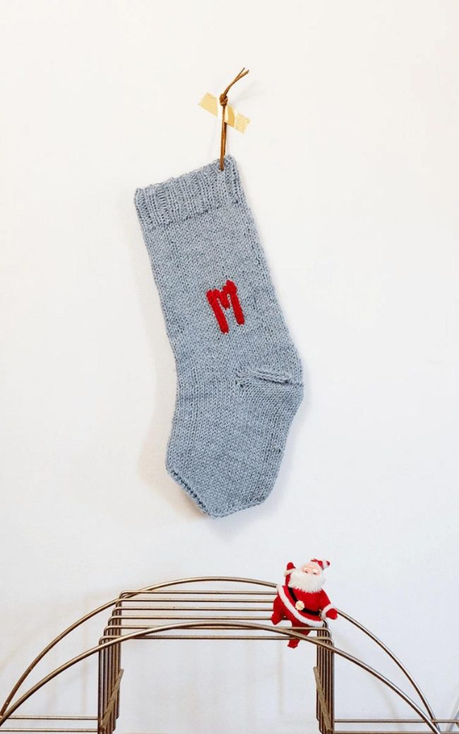 Red Santa Figures Gray Knits