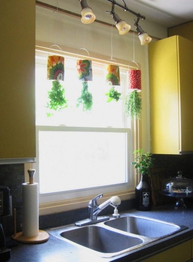 Yellow Kitchen With Green Herbs