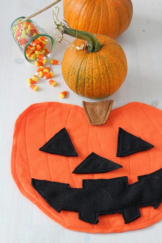 Orange Pumpkins, Black Felt Smiles