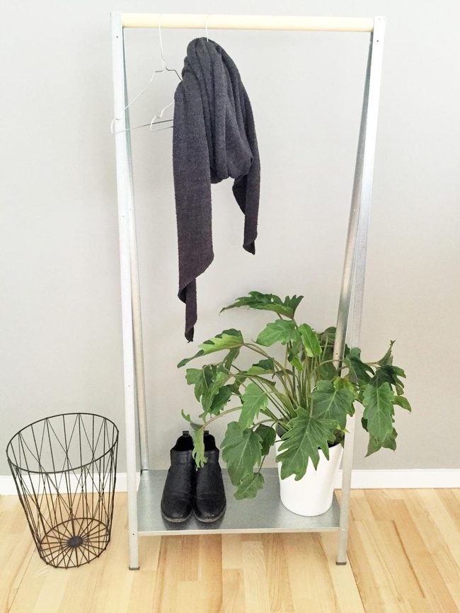 Black Boots, Green Plants, Metal Rack