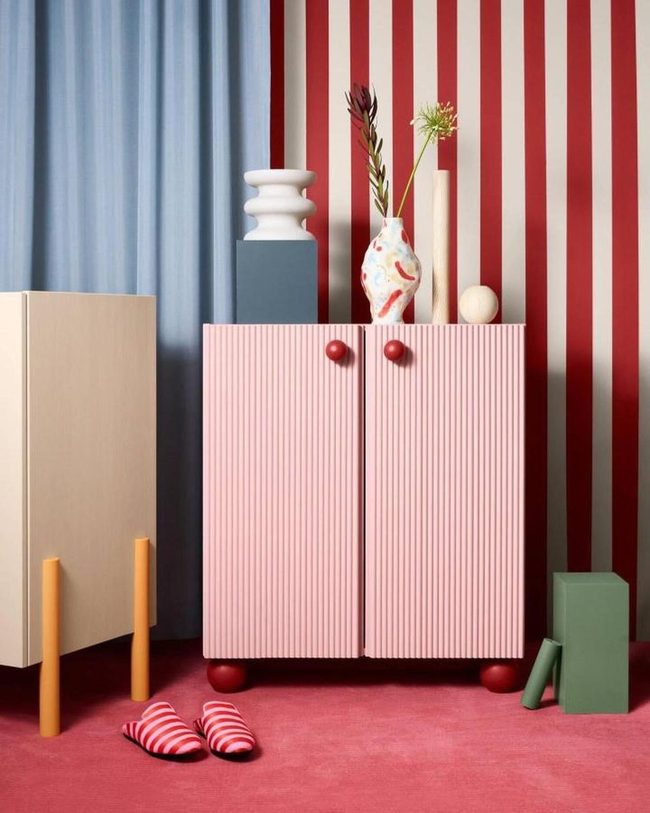 Pink Ribbed Cabinet With Red Ball Feet