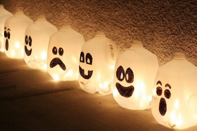 Glowing Jug Jack-O'-Lanterns