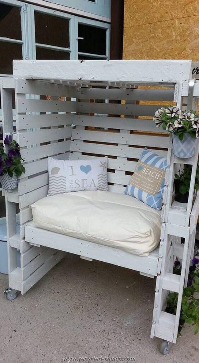Weathered Wood Retreat With Blooming Backdrop