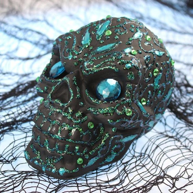 Glittering Black Skulls With Sapphire Eyes