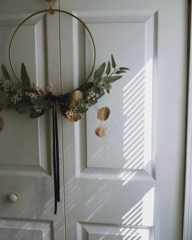 Gold Wreaths On Gray Doors