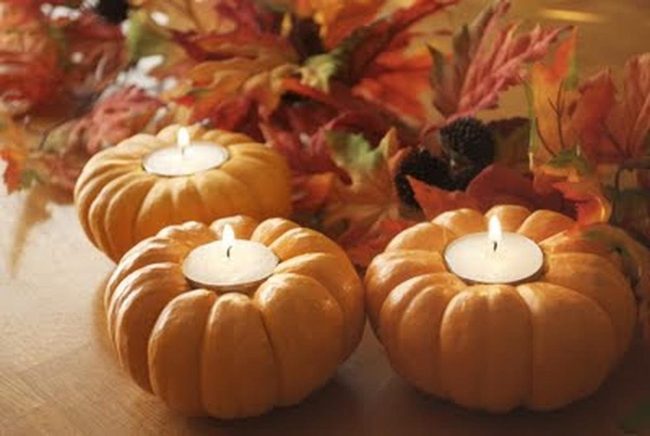 Candlelit Pumpkins With Autumn Leaves