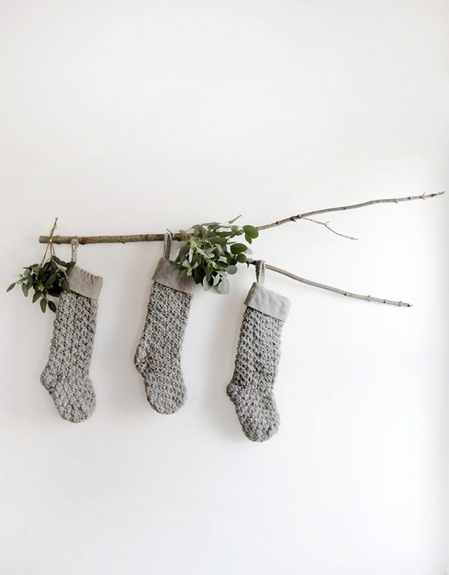 Gray Knit Stockings On Natural Branch