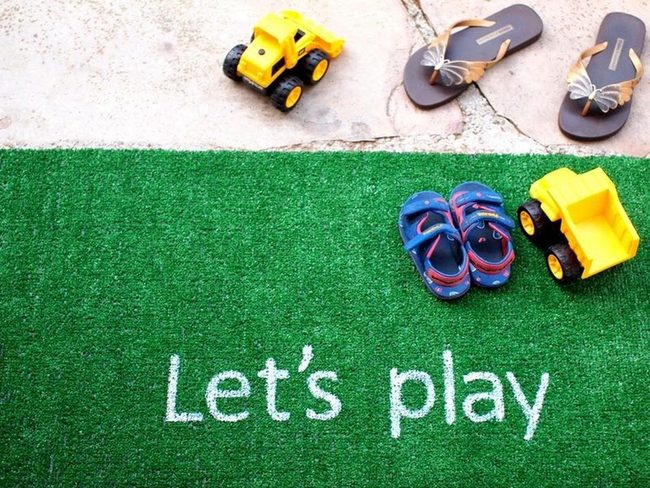 Yellow Trucks On Green Play Mat